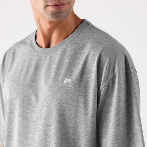 Gift the Clubhouse Oversized T-Shirt in Light Gray - a laid-back yet stylish choice for gym sessions or casual hangouts.